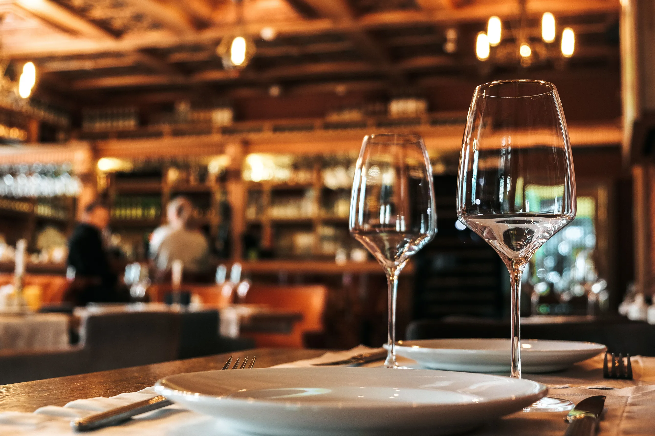 A beautifully laid dining table set for formal service